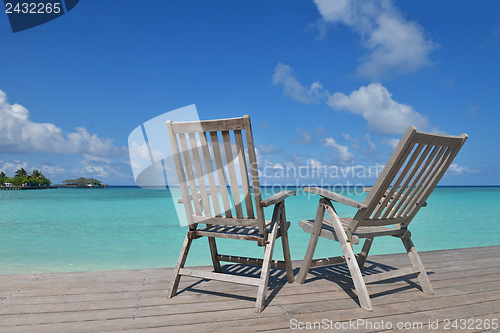 Image of tropical beach chairs