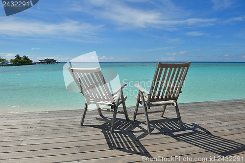 Image of tropical beach chairs