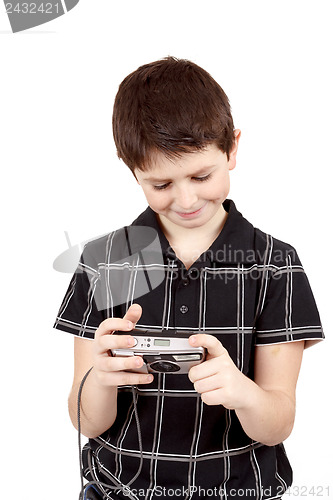 Image of small boy checking analog camera settings