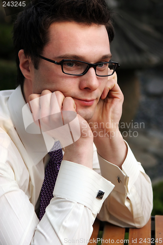 Image of Reflective businessman