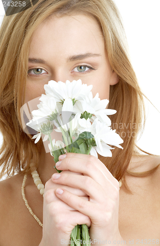 Image of girl with white chrysanthemum