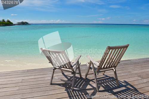 Image of tropical beach chairs