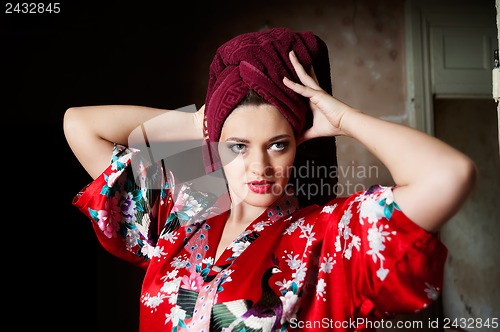 Image of pretty woman with a towel