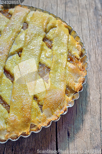 Image of Apple Pie On Wooden Background