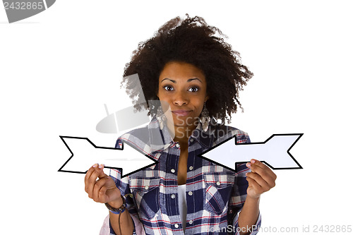 Image of Young african american holding blank arrows