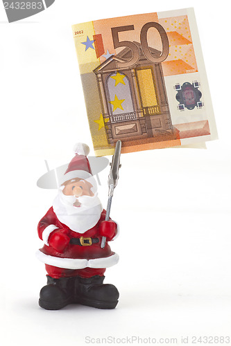 Image of Santa clause figurine with fifty Euro