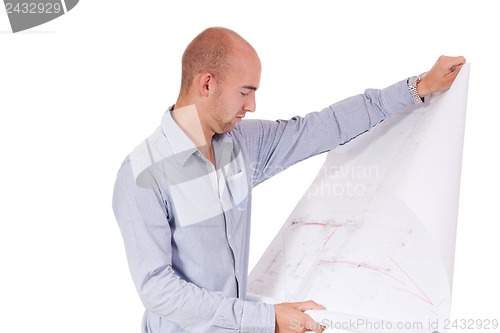 Image of young adult businessman architect with blueprint 