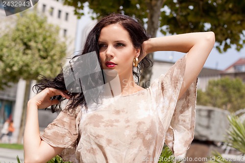 Image of beautiful brunette woman fashion outdoor in summer