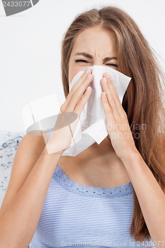 Image of young brunette woman with flu cold influenza 