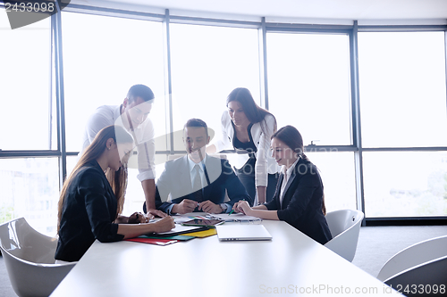 Image of business people in a meeting at office