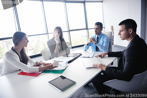 Image of business people in a meeting at office