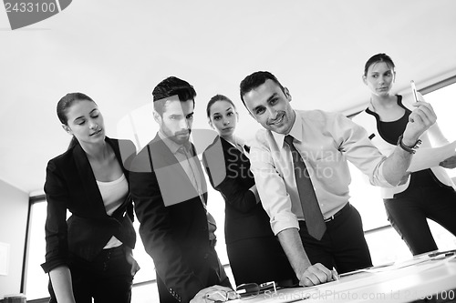 Image of business people in a meeting at office