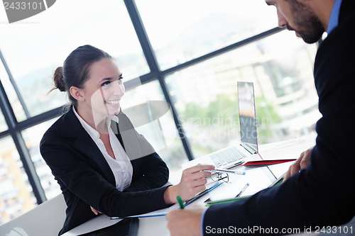 Image of business people in a meeting at office