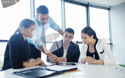 Image of business people in a meeting at office