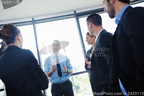 Image of business people in a meeting at office