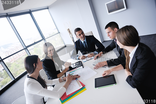 Image of business people in a meeting at office