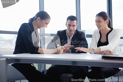 Image of business people in a meeting at office