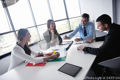 Image of business people in a meeting at office