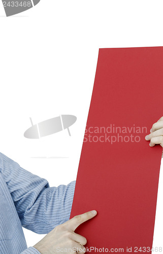 Image of Hand holdong a paper.