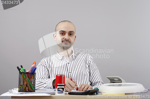 Image of Man at desk