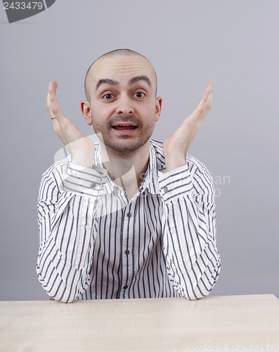 Image of Man at desk