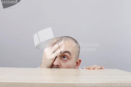 Image of Man at desk