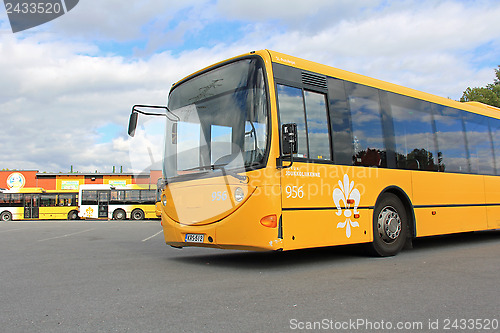 Image of Yellow City Bus at Depot
