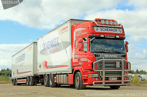 Image of Red Scania With DB Schenker Trailer