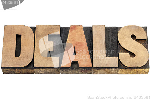 Image of deals word in wood type