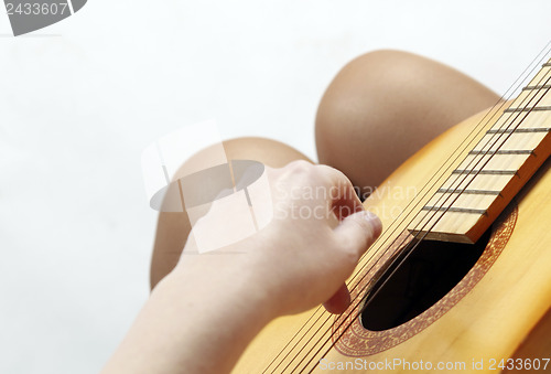 Image of Playing the guitar