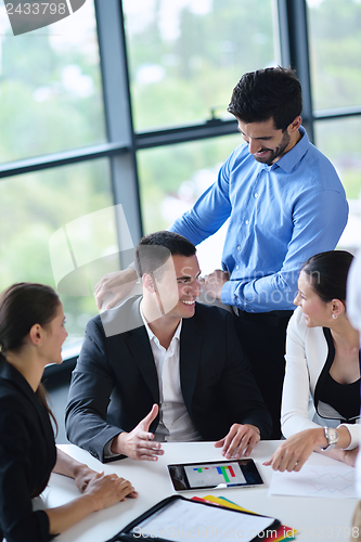 Image of business people in a meeting at office