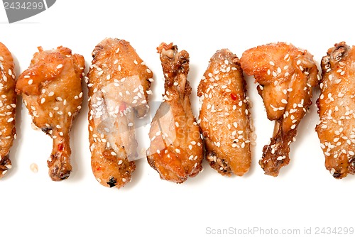 Image of set of fried chicken legs isolated