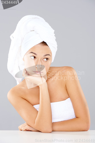 Image of Beautiful serene woman wearing white towels