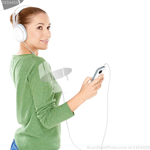 Image of Attractive woman listening to music