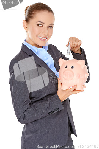 Image of Successful happy woman saving her money