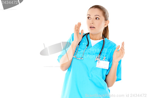 Image of Pretty young nurse is worried
