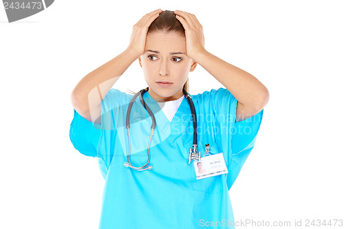 Image of Young beautiful doctor is worried