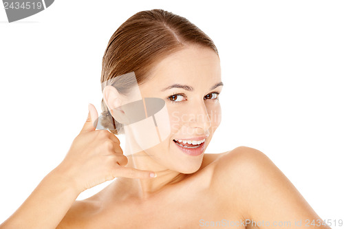 Image of Woman with call me gesture