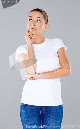 Image of Attractive thoughtful young woman