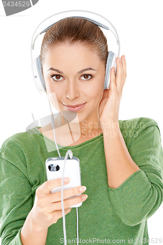 Image of Young woman listening to her music