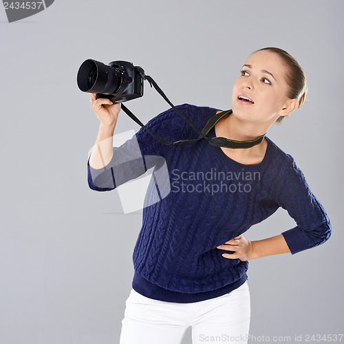 Image of Pretty vivacious young female phoptographer