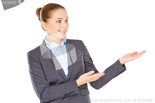 Image of Woman pointing to the side with her hands