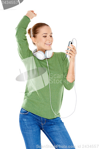 Image of Woman choosing her downloaded music