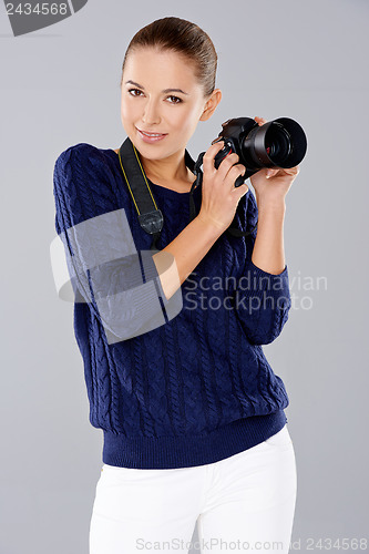 Image of Beautiful female photographer