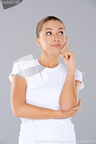 Image of Attractive thoughtful young woman