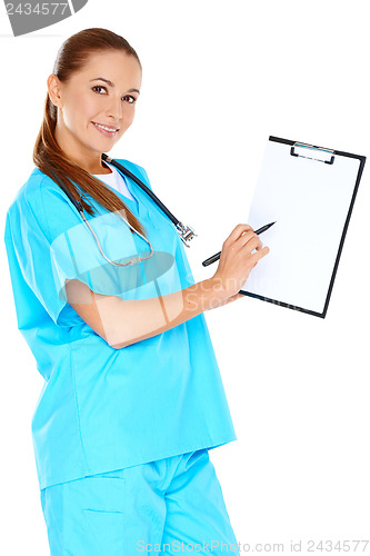 Image of Smiling doctor with a blank clipboard