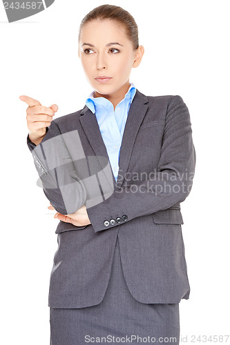 Image of Businesswoman pointing and looking up