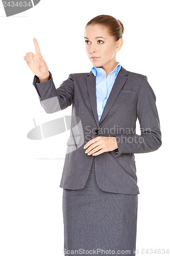 Image of Businesswoman pointing and looking up