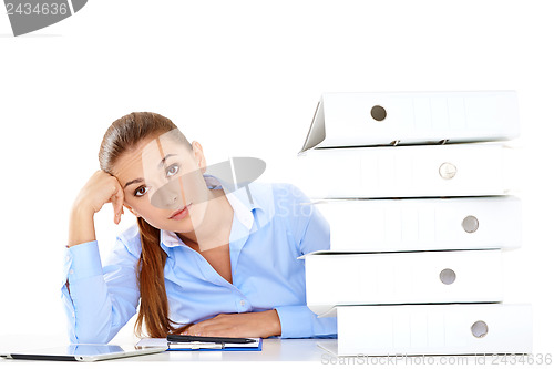 Image of Overworked stressed businesswoman