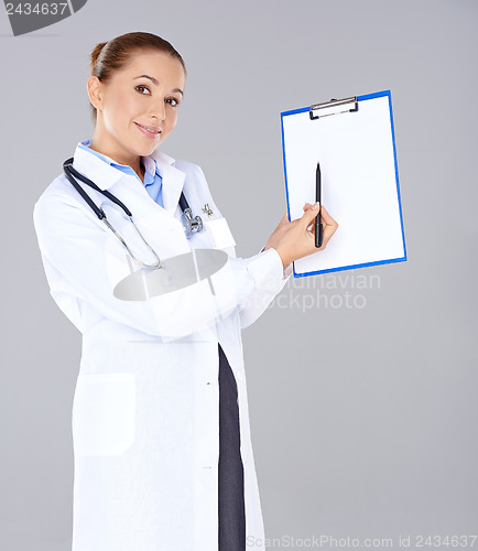 Image of Female doctor or nurse with a clipboard